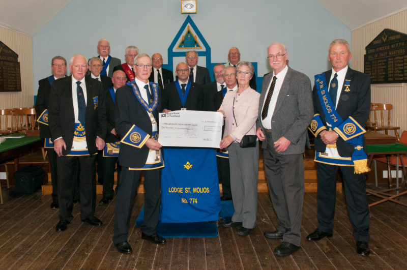 Presentation of cheque for £1600 to representatives of Arran War Memorial Hospital Supporters' League charity